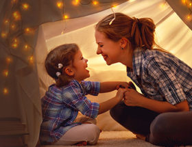 mum playing with child